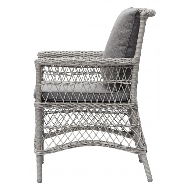 Ulkoruokailutuoli harmaasta rottingista tyynyllä Ulkoruokailutuoli harmaasta rottingista tyynyllä